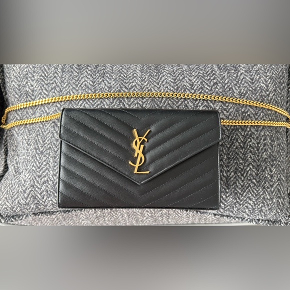 Yves Saint Laurent Handbags - Yves Saint Laurent Black Chevron Clutch with Gold Chain